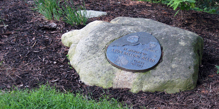 plaque on rock in garden