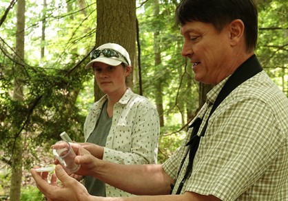 A man and woman in the woods