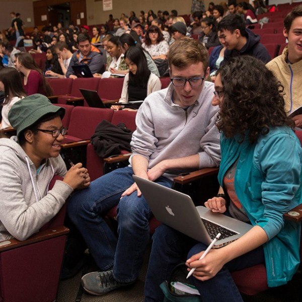 Students work together in class