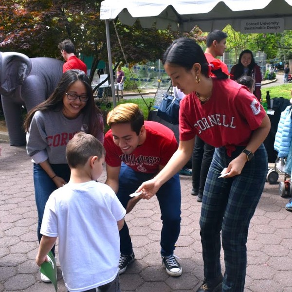 students talking to children