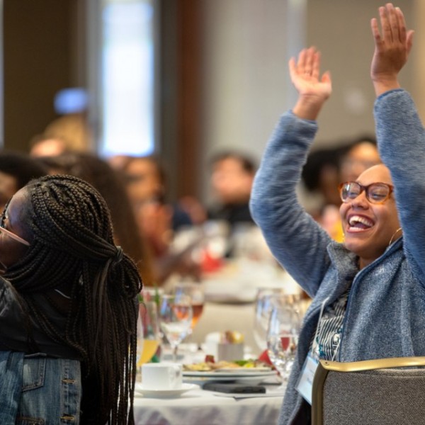 students reacting to speeches with shouts of encouragement