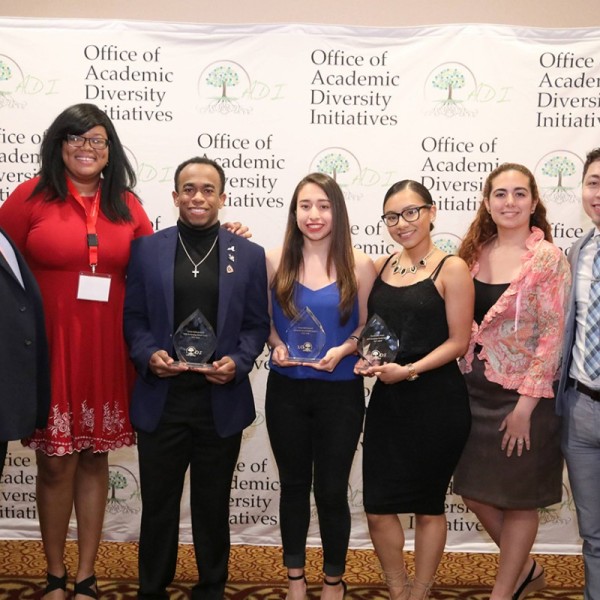 Winners pose with their awards