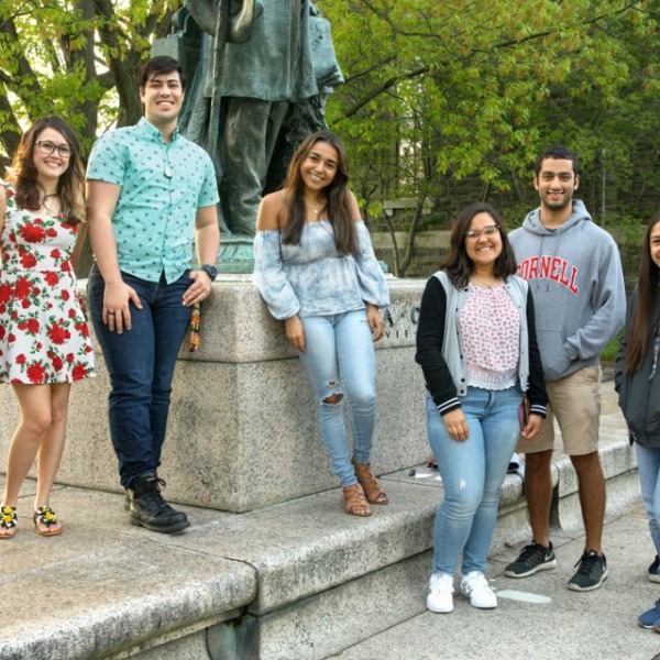 Students pose on Cornell's campus