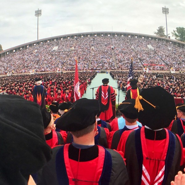 Stadium full of students celebrating graduation