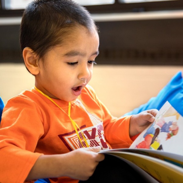Child reads book
