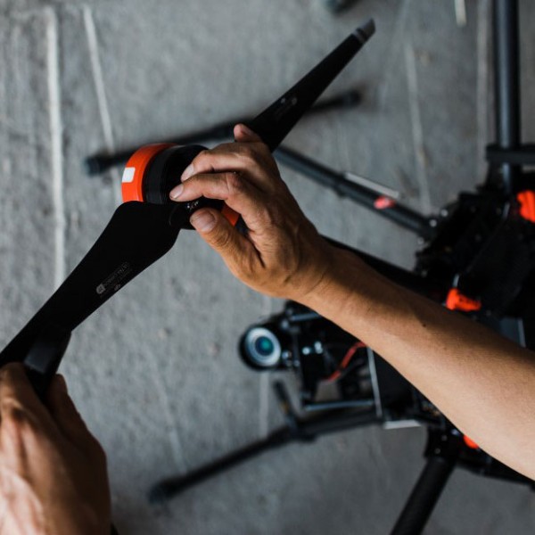 A student tinkers with a UAV