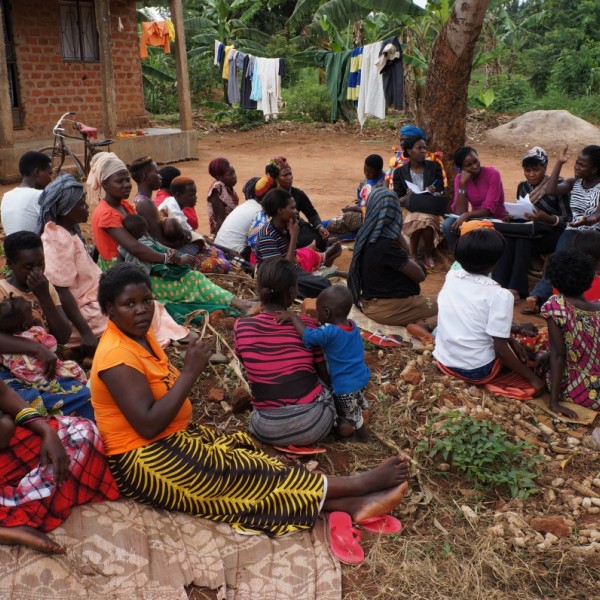 Researchers speaking with farmers