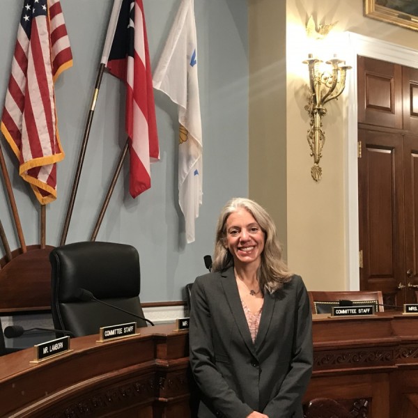 Amanda Rodewald stands in a congressional hearing room