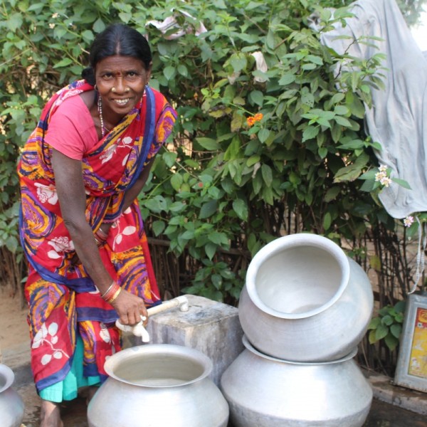 woman with pots in India