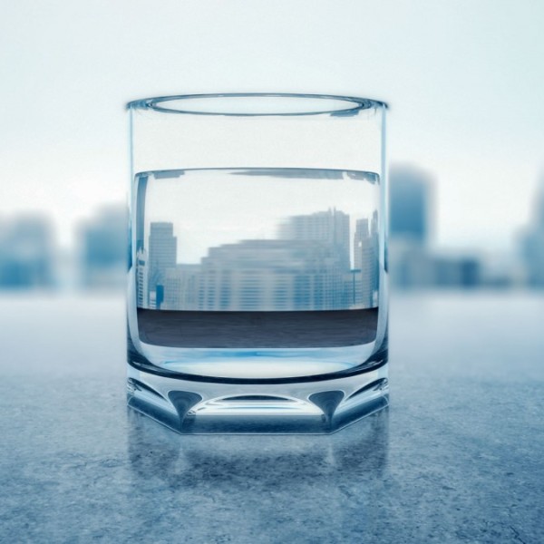 Glass of water overlooking the New York skyline
