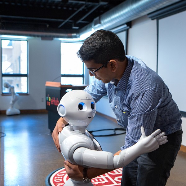 Vighnesh Vatsal gives Pepper a hug