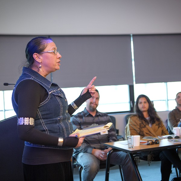 Angela Ferguson speaks while others listen