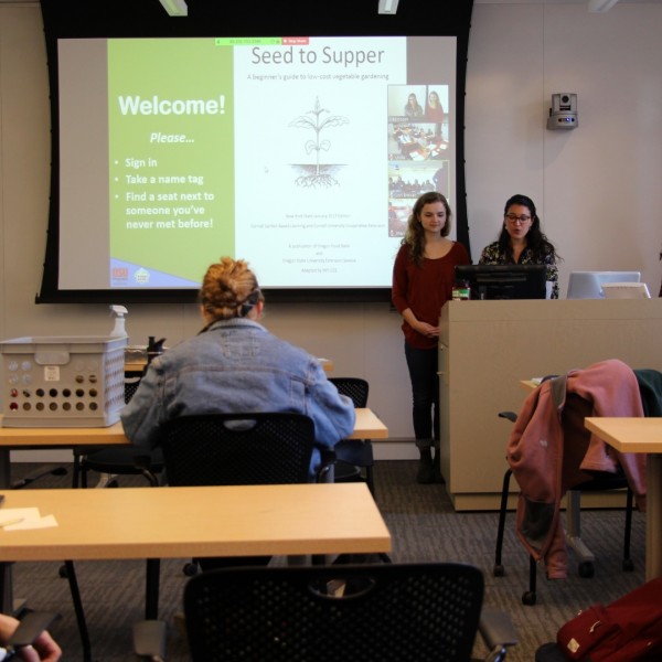 Cornell students leading a webinar in classroom
