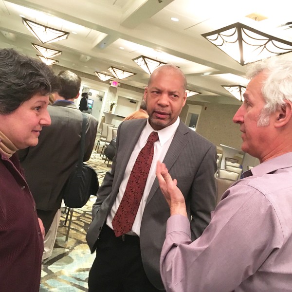 Irene Weiser, Lance Collins and Todd Cowen talking