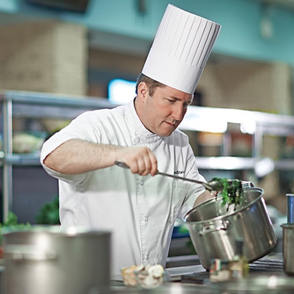 Chef cooking vegetables