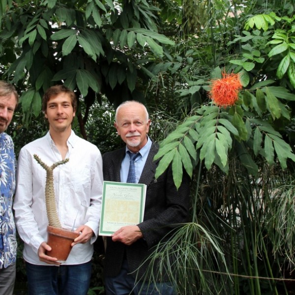 Nicolas Glynos receives award from Ed Cobb and Karl Niklas