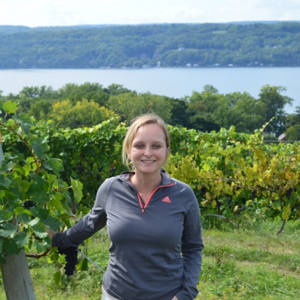 Megan Hall at a vineyard overlooking Seneca Lake