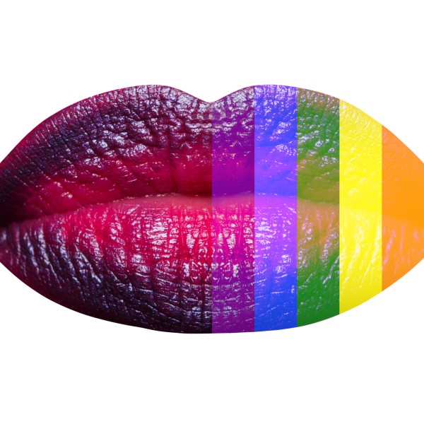 A close up of lips wear pink and purple lipstick; a rainbow filter is over the right half
