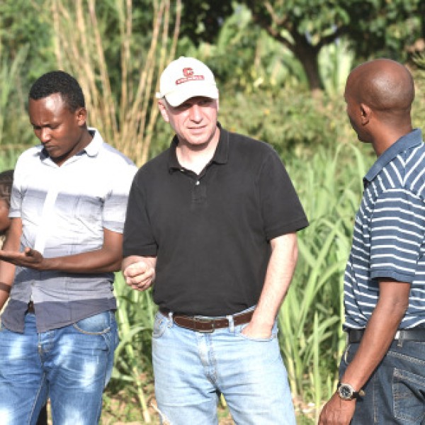 A group of people stand in a field in Awassa, Ethiopia