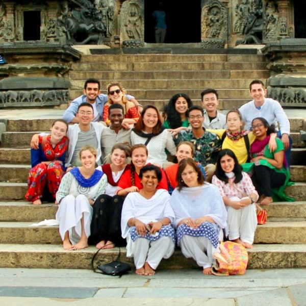 Group of students gather on a staircase 