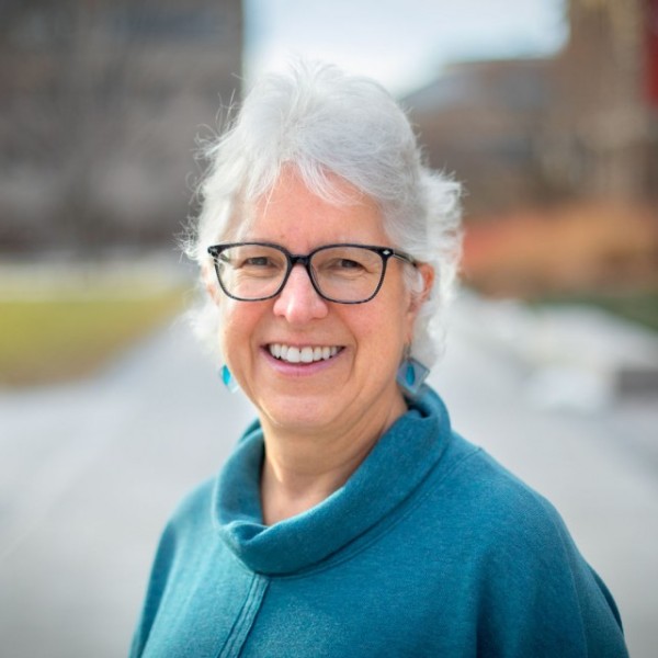 A woman smiles on Tower Road