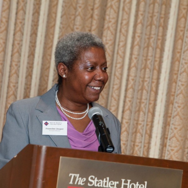 Leader speaking at podium