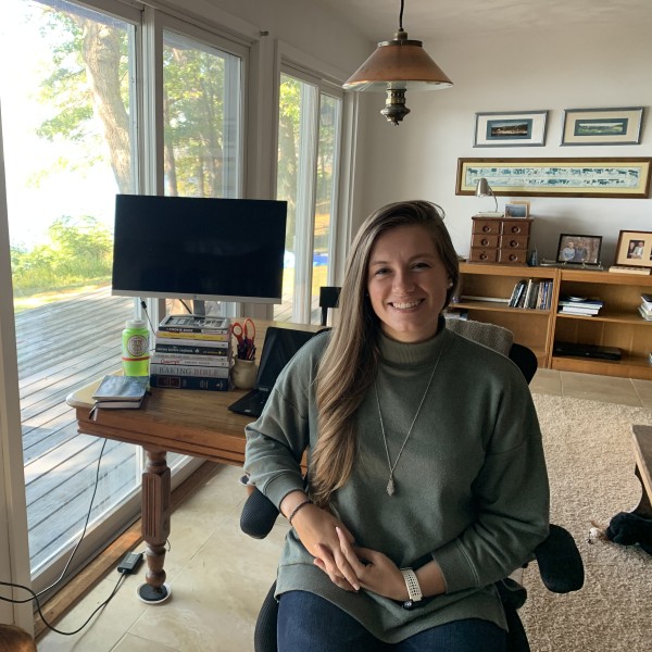 A female sitting at a desk