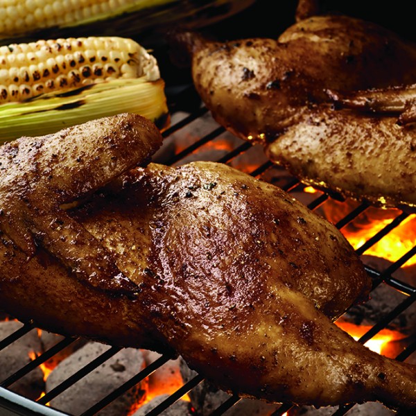 Chicken and corn on a grill