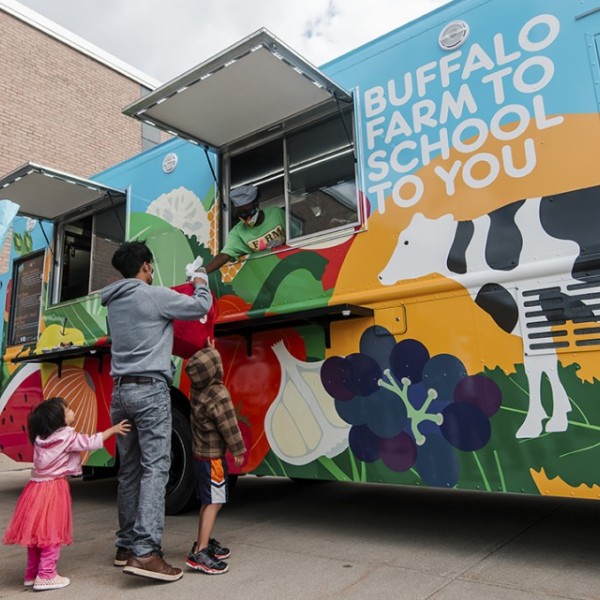 Hungry customers outside a food truck in Buffalo, NY
