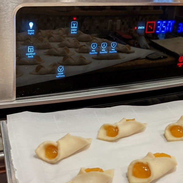 apricot filled cookies on a cooling rack