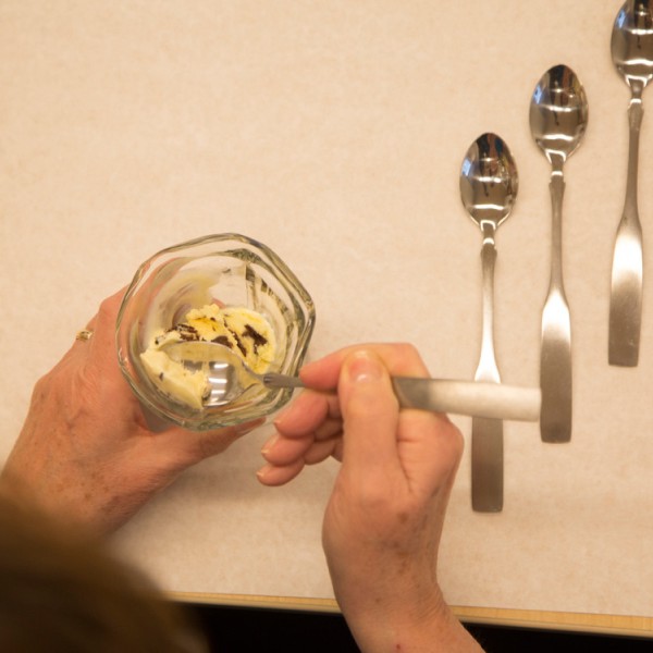 Looking down on someone as they eat ice cream