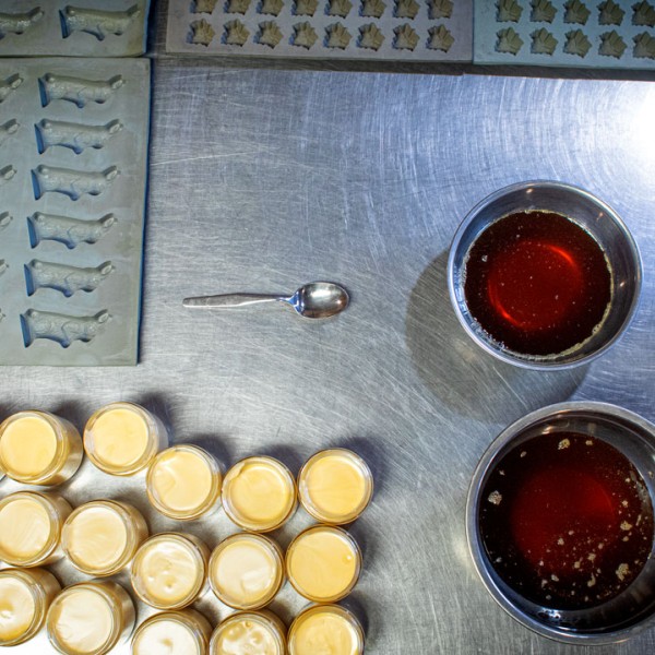 maple sugar, maple syrup and sugar maple candy molds on a table