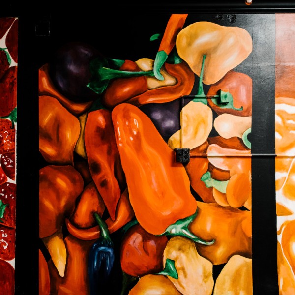 Mural painting of red and orange fruits