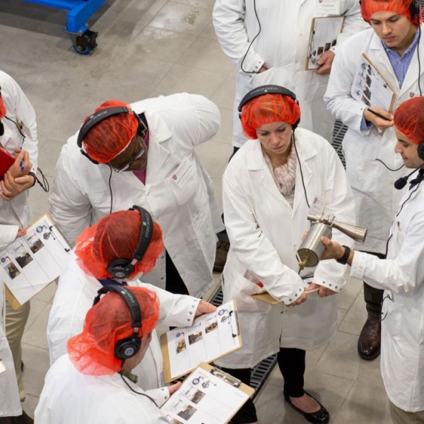 Man teaches food inspectors.