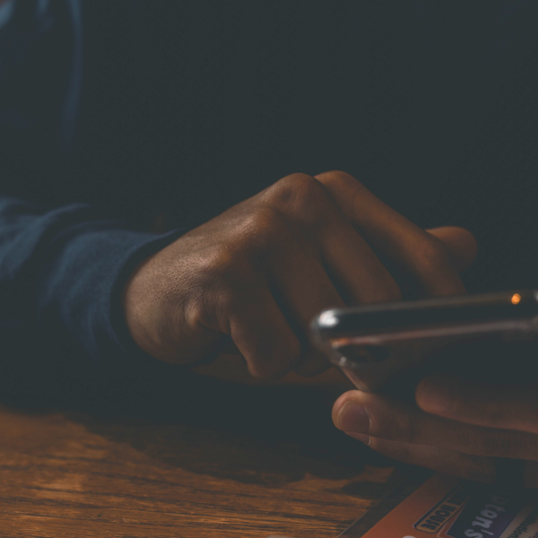 Close up shot of a hand holding a mobile phone