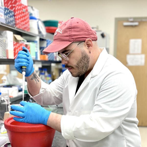 A man performs research in a lab.