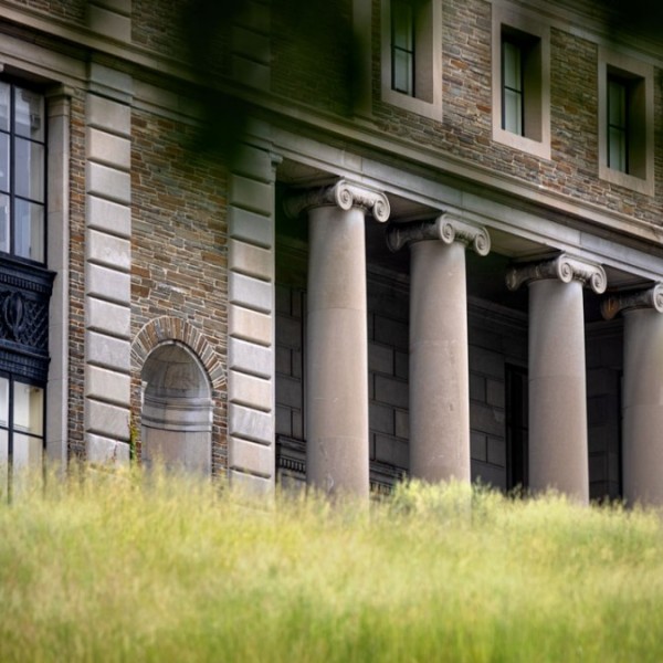 A columned building in summer