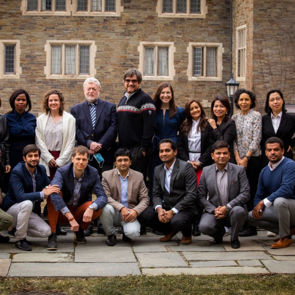 Group of Humphrey fellows pose for a photo on campus