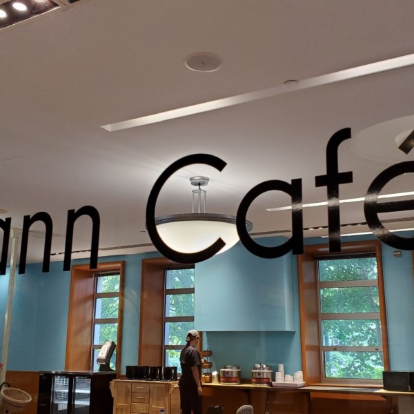 A window in Mann Library that says Mann Cafe