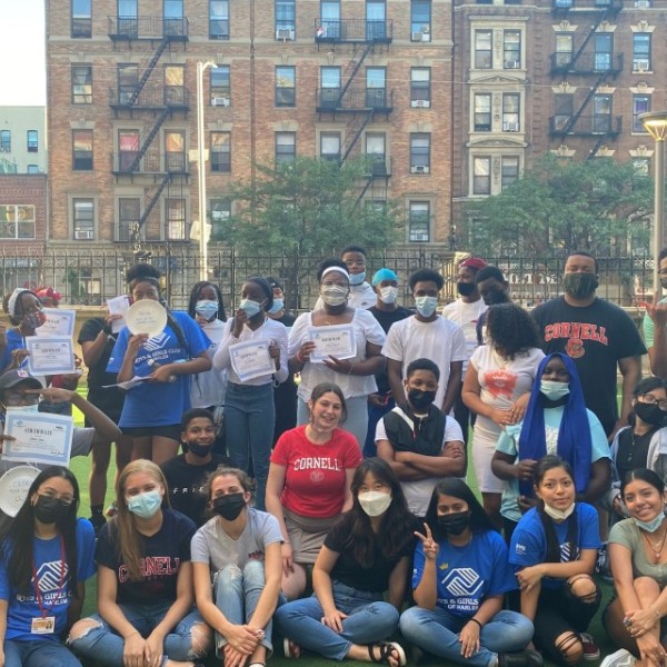 Youth participants and researchers celebrate the completion of the program at the Boys and Girls Club of Harlem