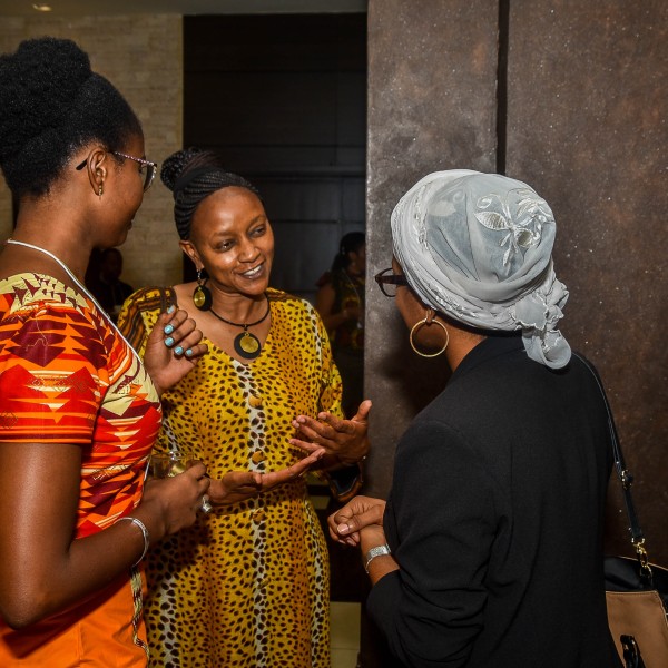 Three women speak at event
