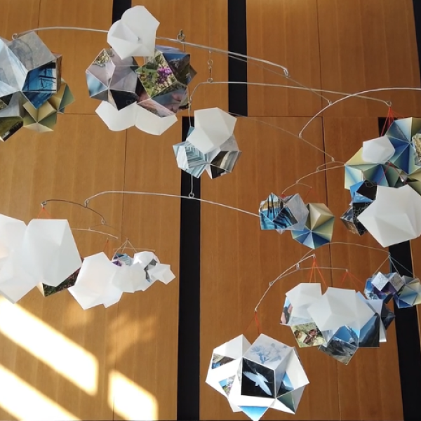 The kinetic installation of hanging sculptures 