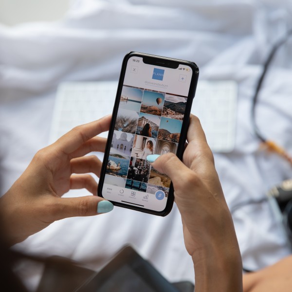 A hand holds a phone