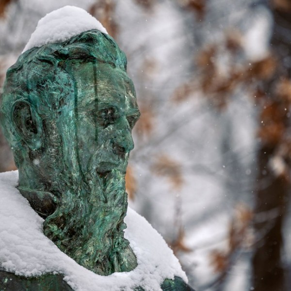 The statue of Ezra Cornell on the Arts Quad is seen covered in snow following a winter storm