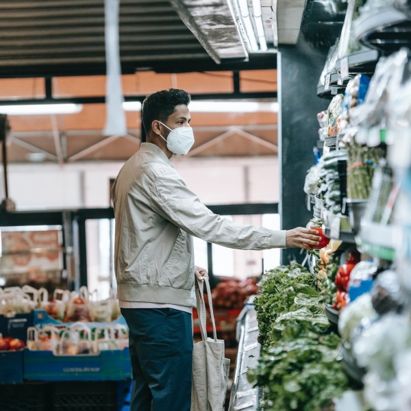 A man grocery shopping