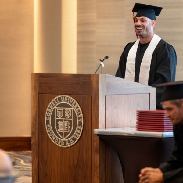 Cornell CPEP graduate Kenneth Rogers speaks during a July 10 commencement ceremony at the Statler Hotel.