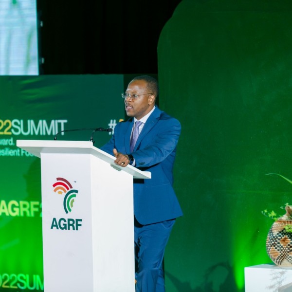 Ed Mabaya speaks from a podium