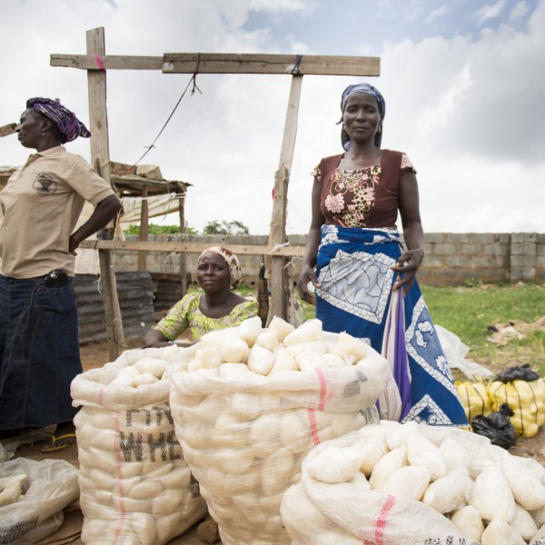 Woman stands in field