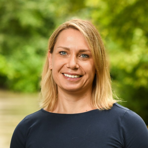 woman smiles at camera