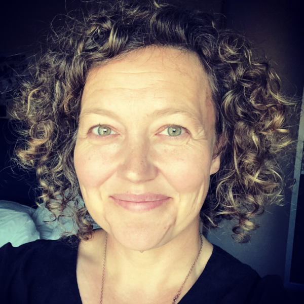 woman with short curly hair